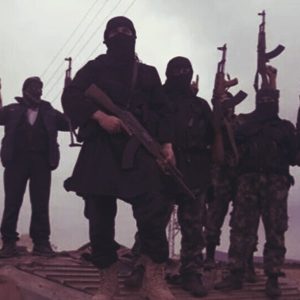 A group of masked armed terrorists. A group of masked armed terrorists.